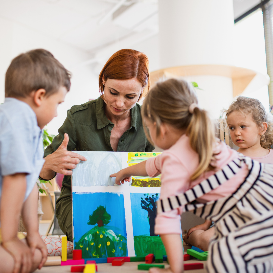An early years practitioner working with children