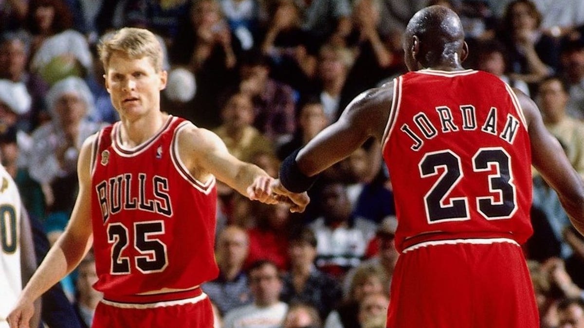 Steve Kerr and Michael Jordan on the court as teammates for the Chicago Bulls