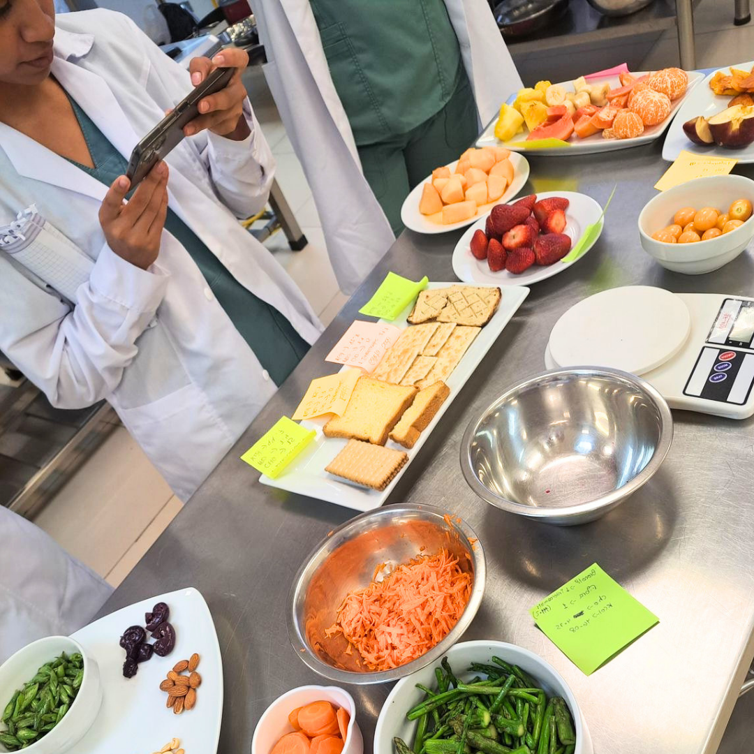 Students prepare and assess a variety of foods during a practical nutrition and dietetics session