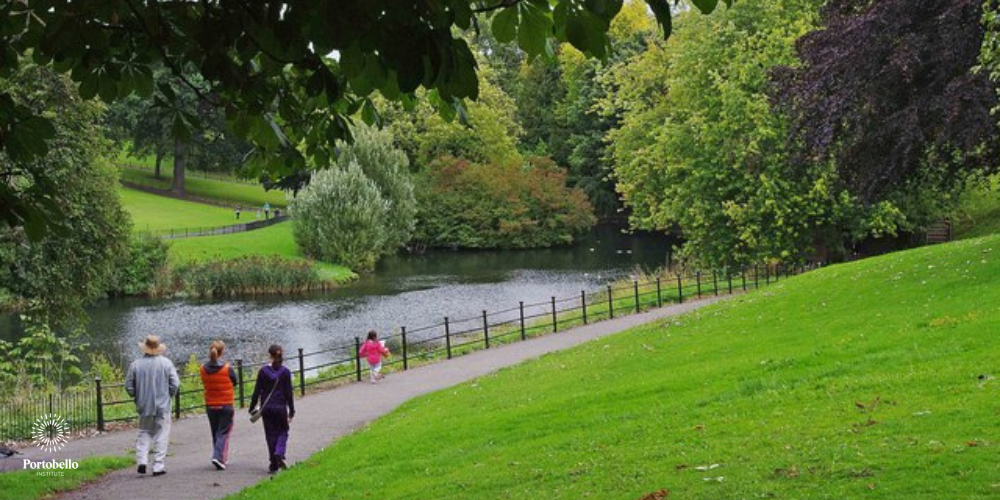 walking on a path beside a lake in Phoenix Park Dublin Ireland
