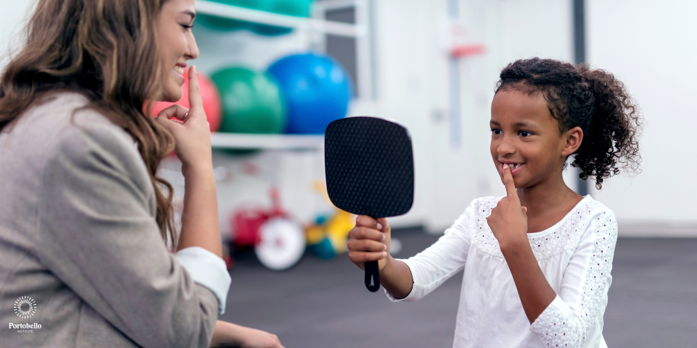 a speech and language therapist working with a child