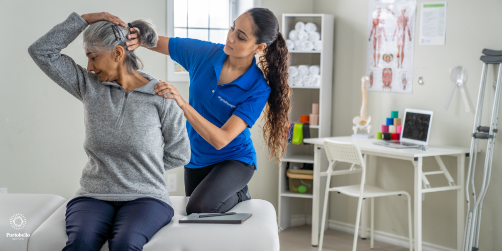 physiotherapist works with a lady supporting her to stretch her neck and back