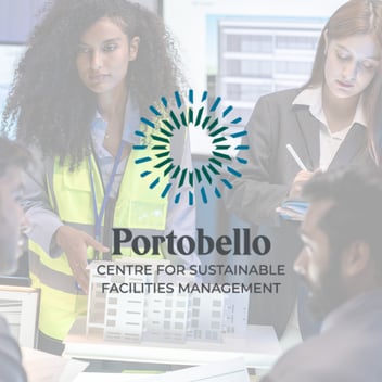 Facilities management professionals discussing workplace operations and industry challenges in a professional setting