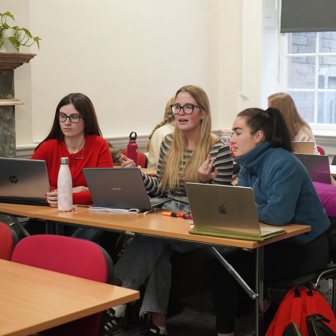 A group of Portobello Institute students collaborating in class