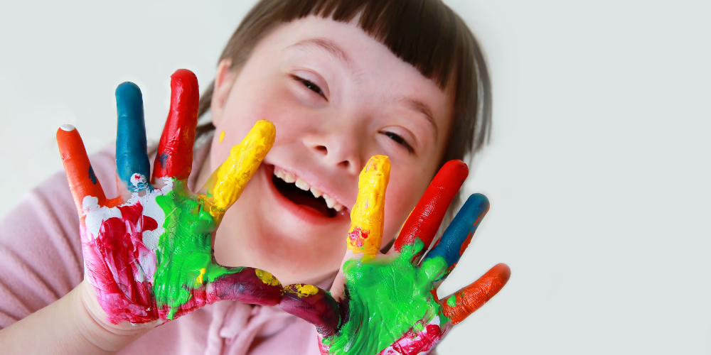 child with painted hands 